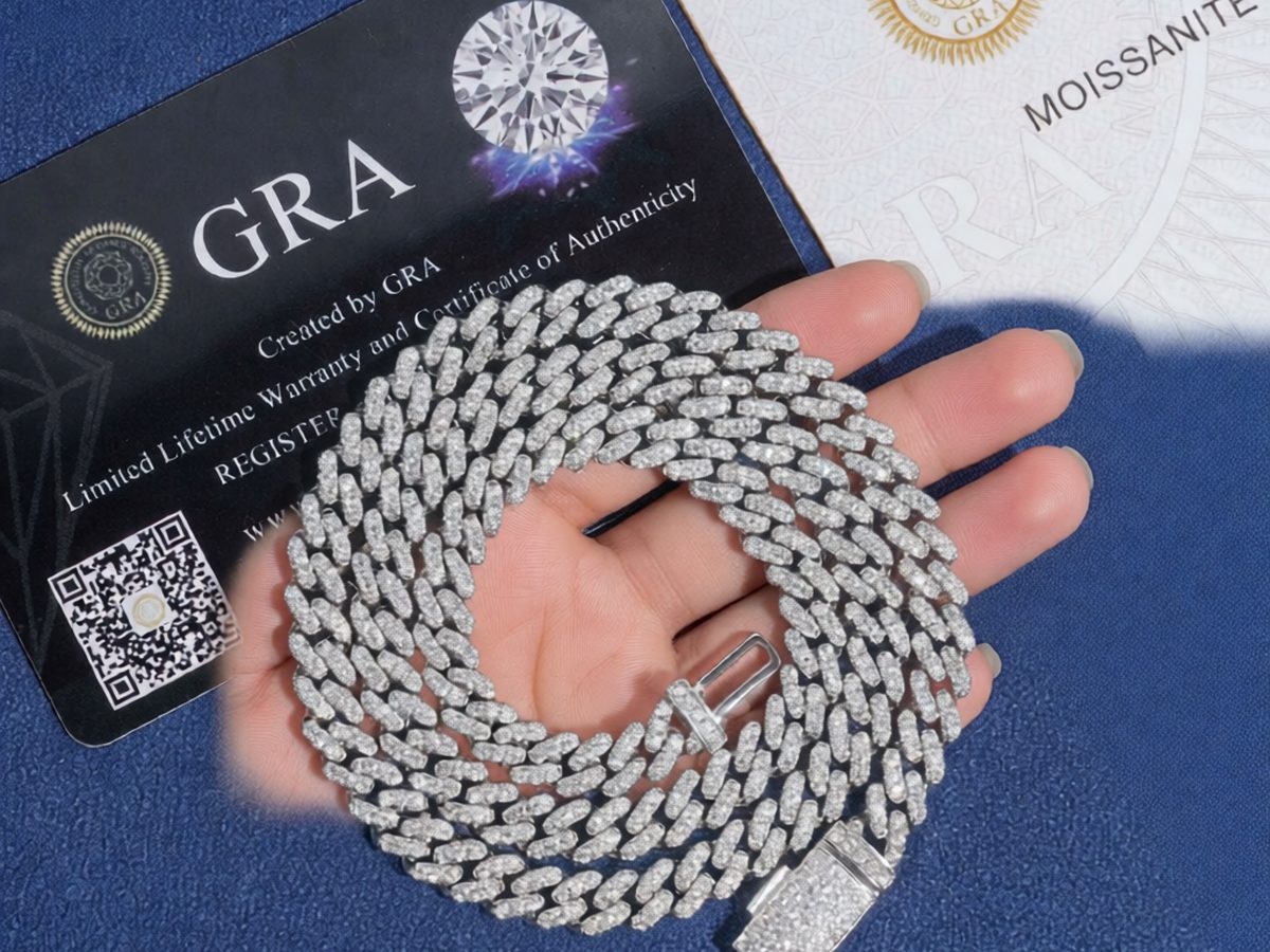 Moissanite Cuban link chain in 925 sterling silver, 6.5mm single row, shown with a gold or rhodium finish